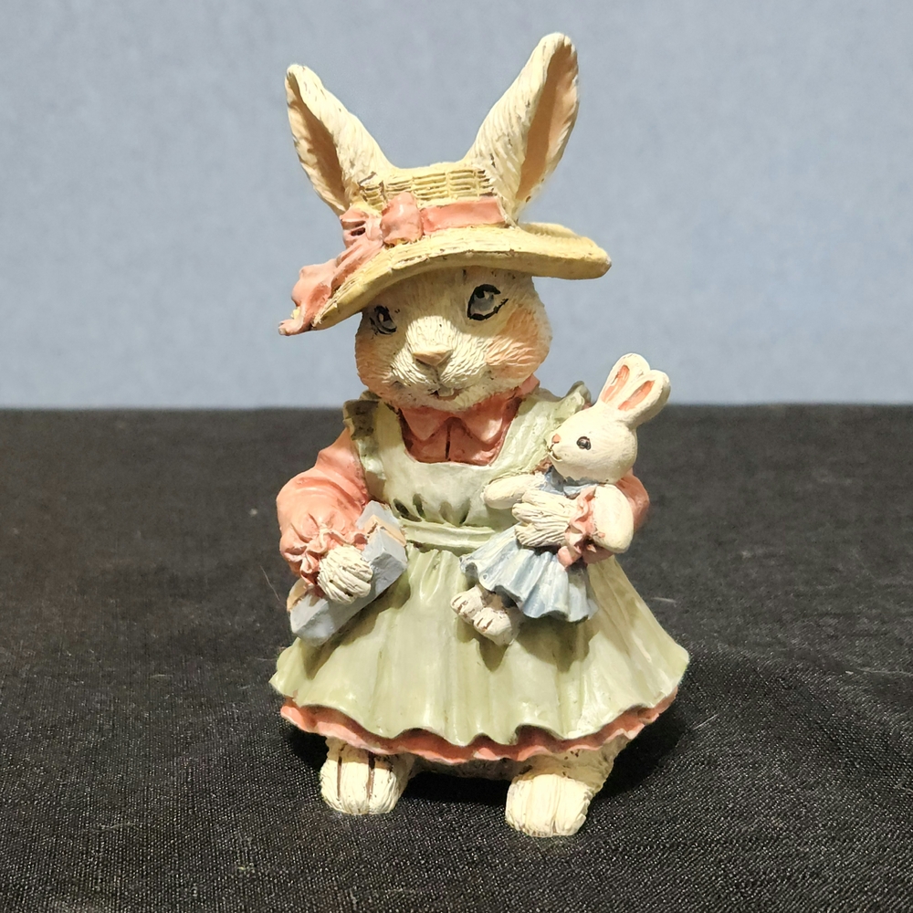 Charming Rabbit Figurine with Hat and Doll